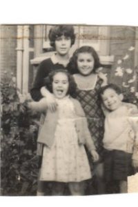 Me with my two sisters and brother William outside 14 College Avenue where the spooky event took place.